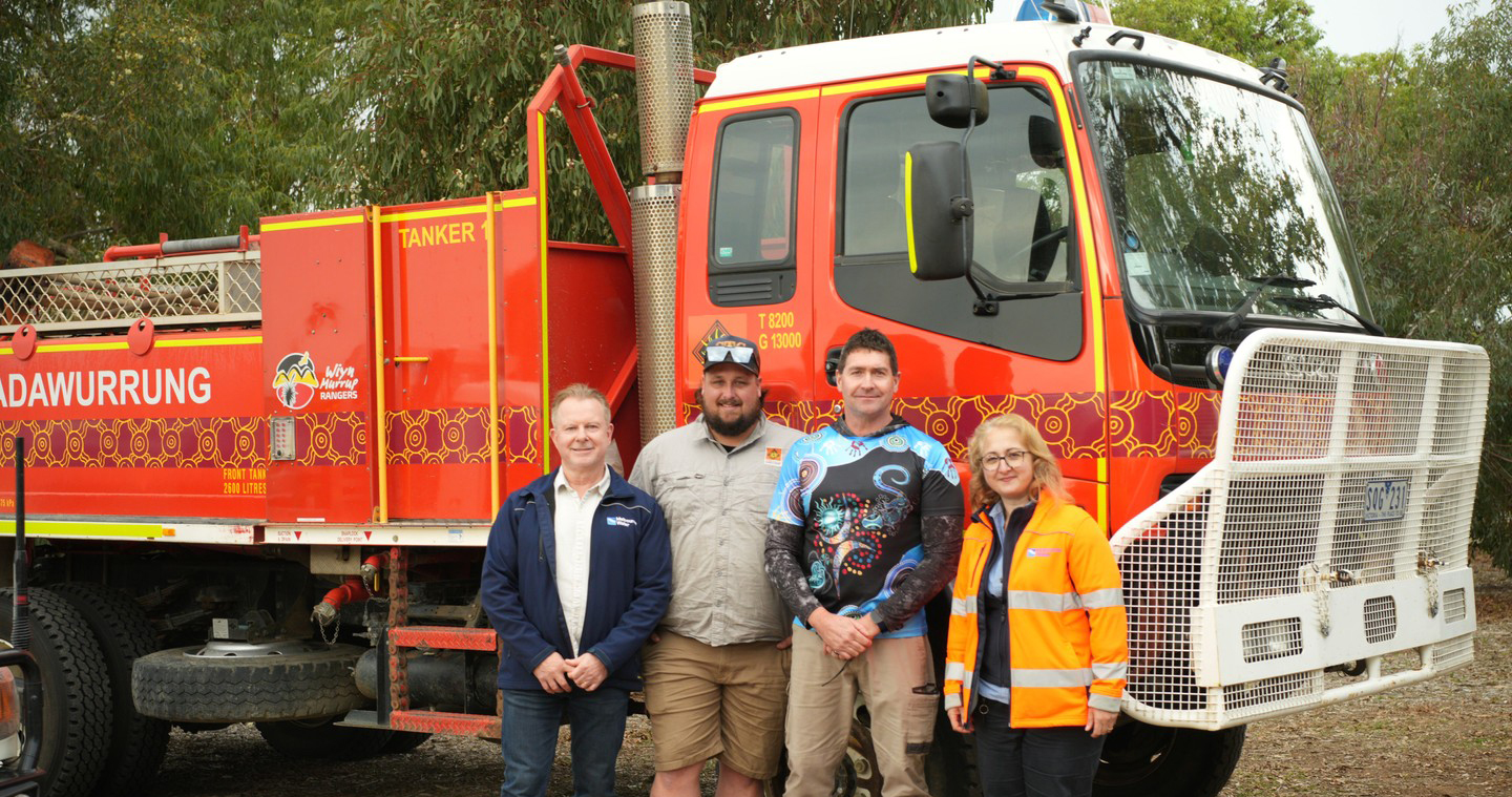 Wadawurrung fire truck with 4 people smiling in front